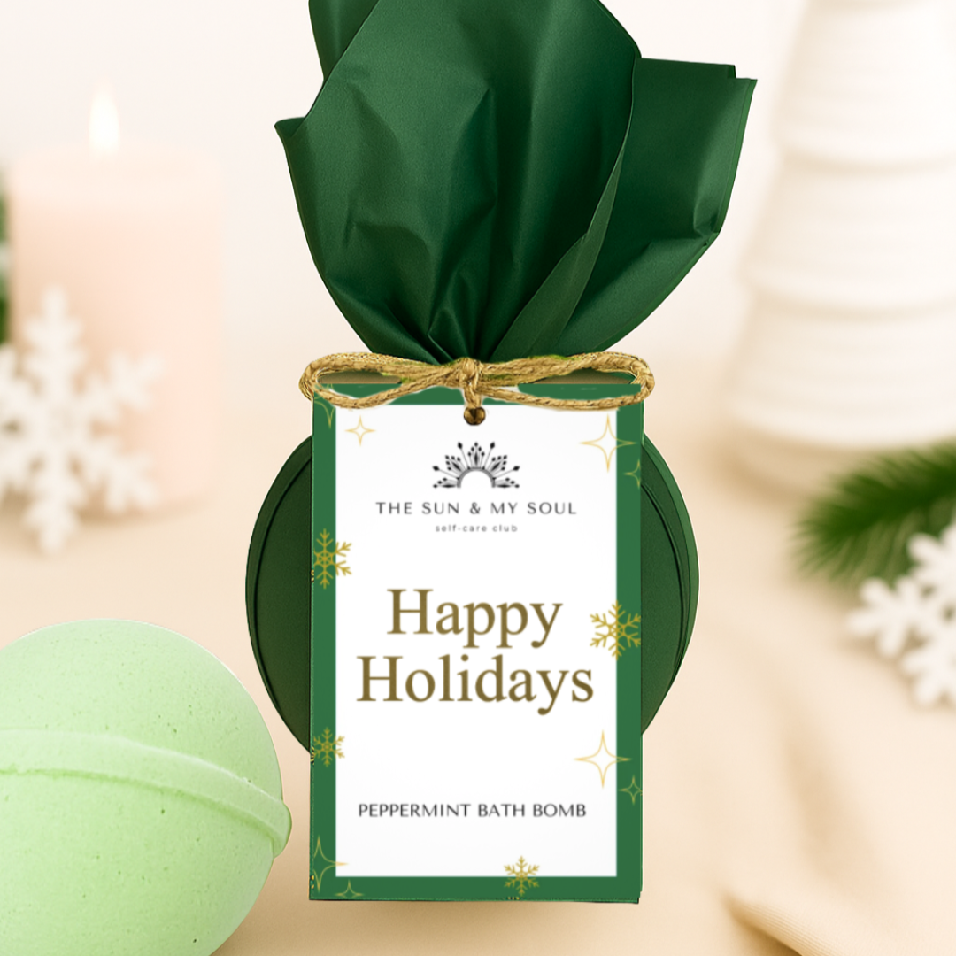Green bath bomb with 'Happy Holidays' packaging on a beige background