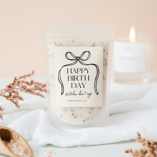 Bath salts with 'Happy Birthday, Witches don't age' text on a white background