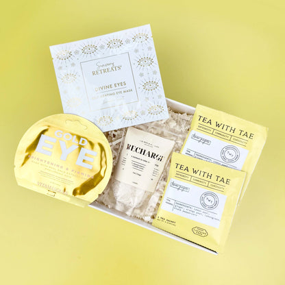 Packaged tea with visible branding on a yellow background
