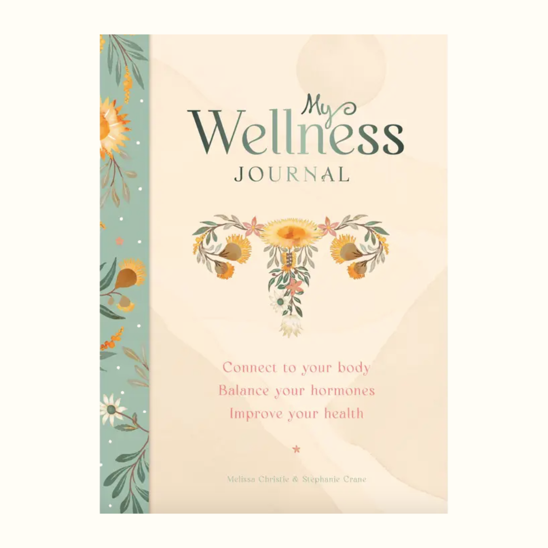Wellness journal with floral design and text on a white background