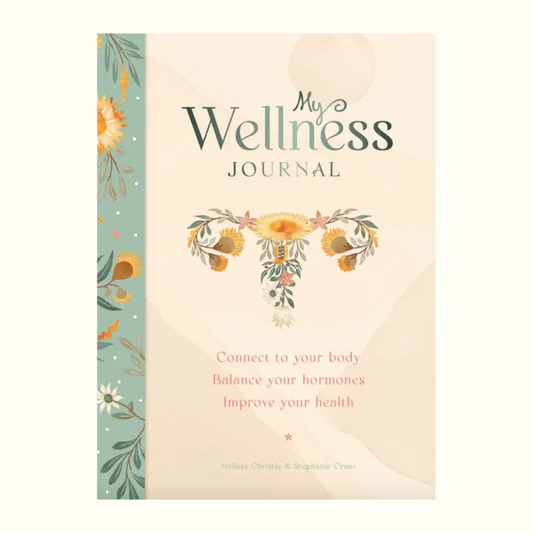 Wellness journal with floral design and text on a white background