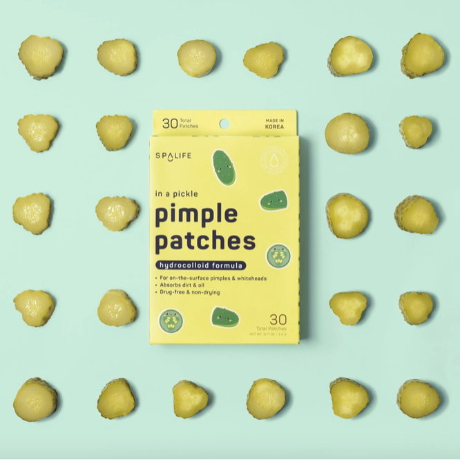 SpaLife pimple patches packaging with multiple patches on a light green background